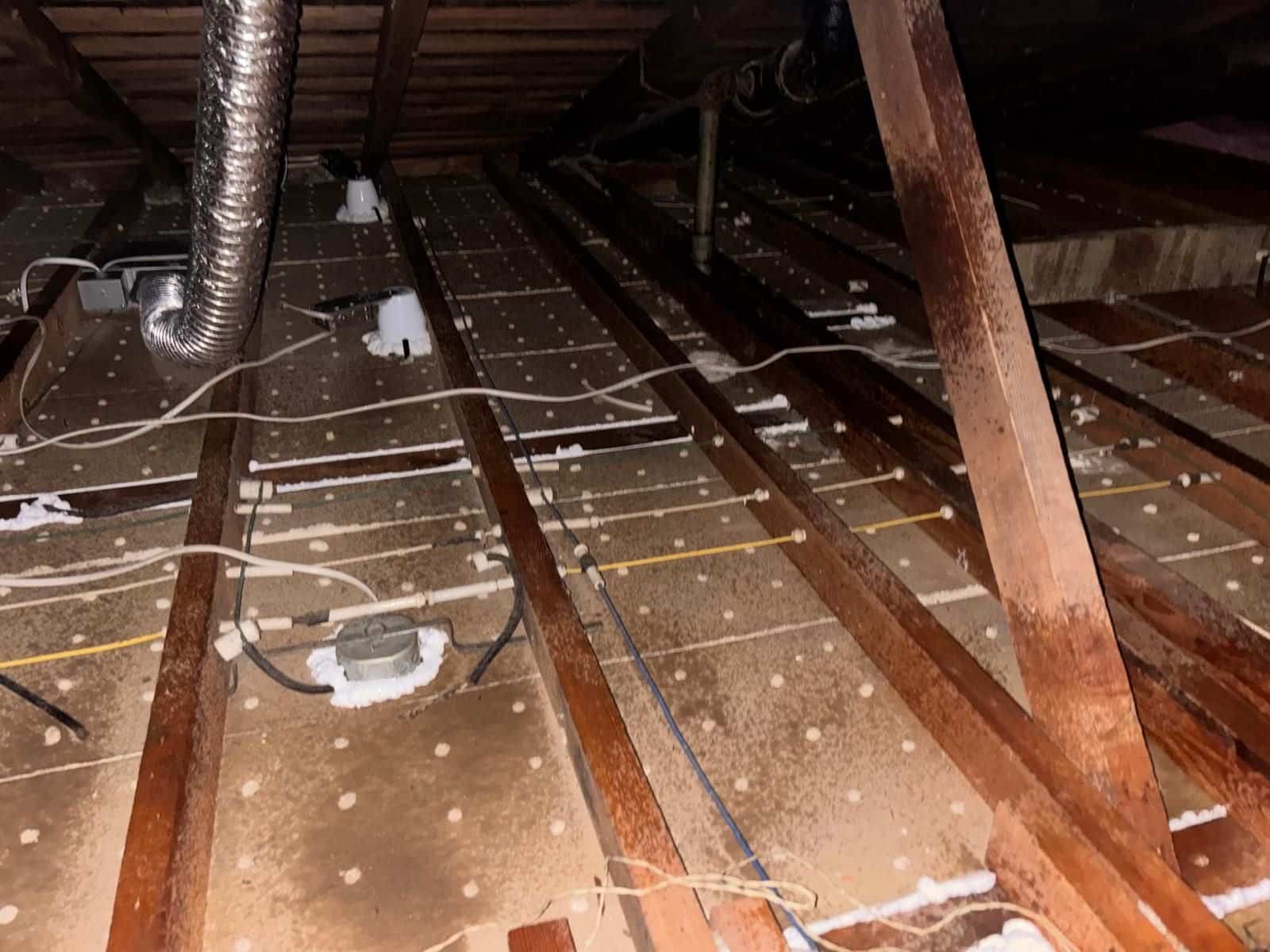 Long Beach attic after removal, joists and deck cleaned