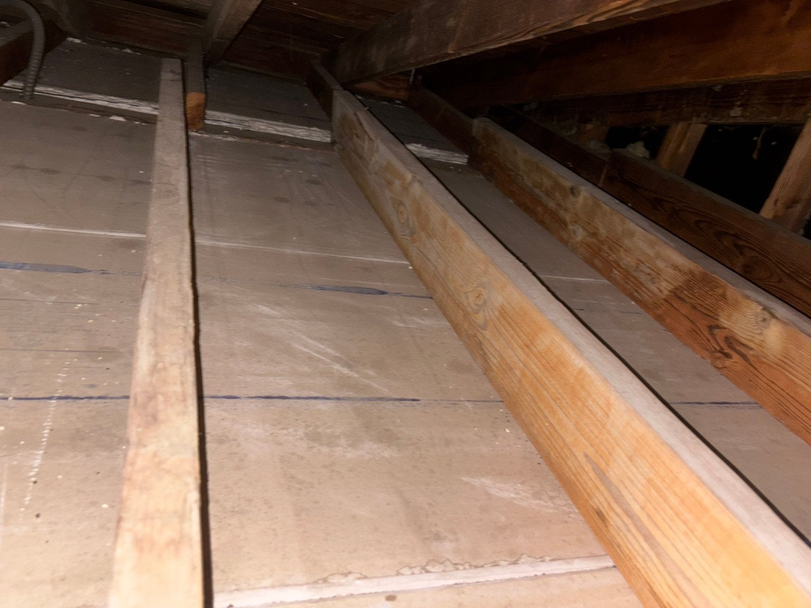 Los Angeles attic after removal, joists and deck cleaned