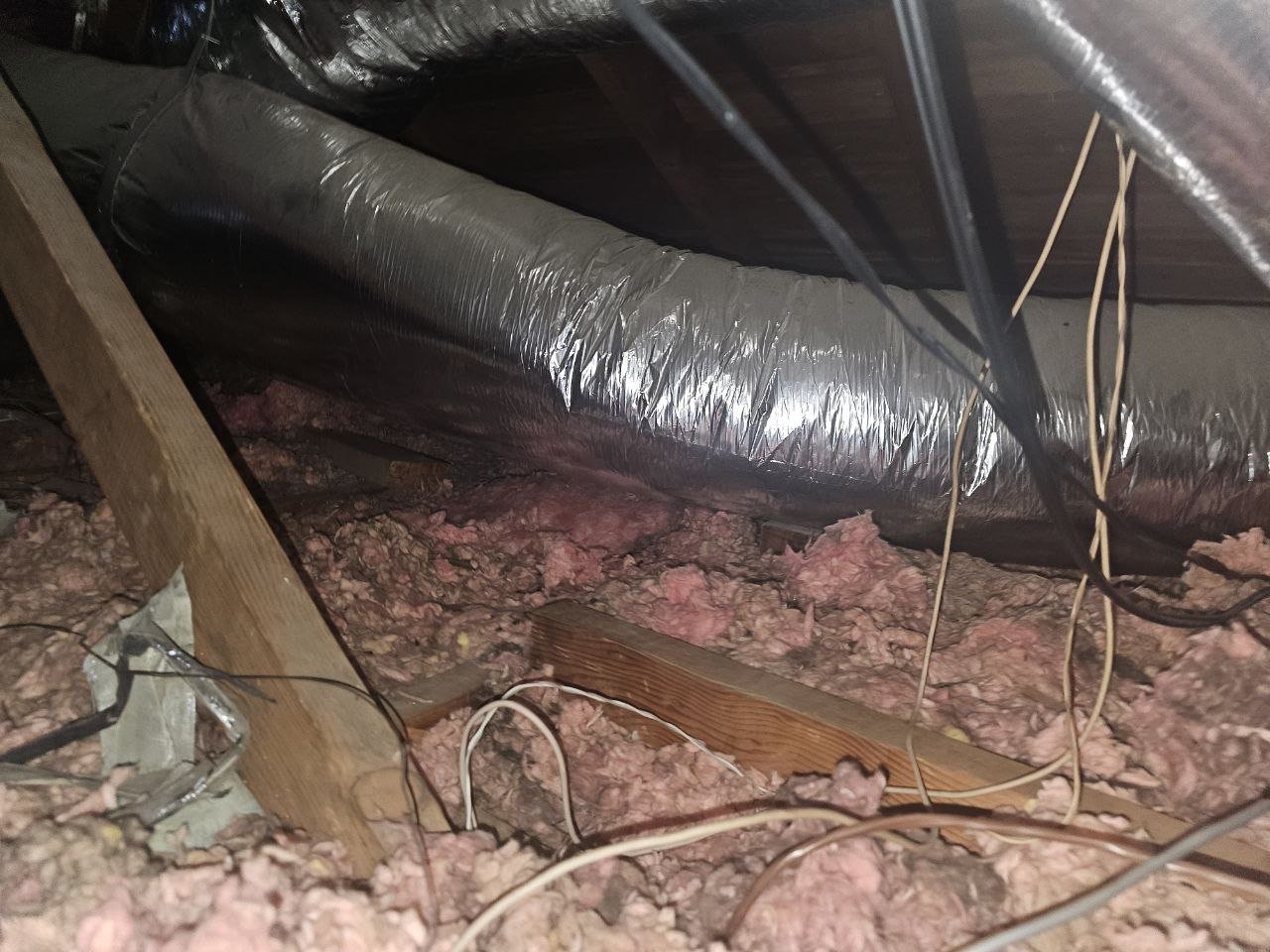 Los Angeles attic before work, old insulation
