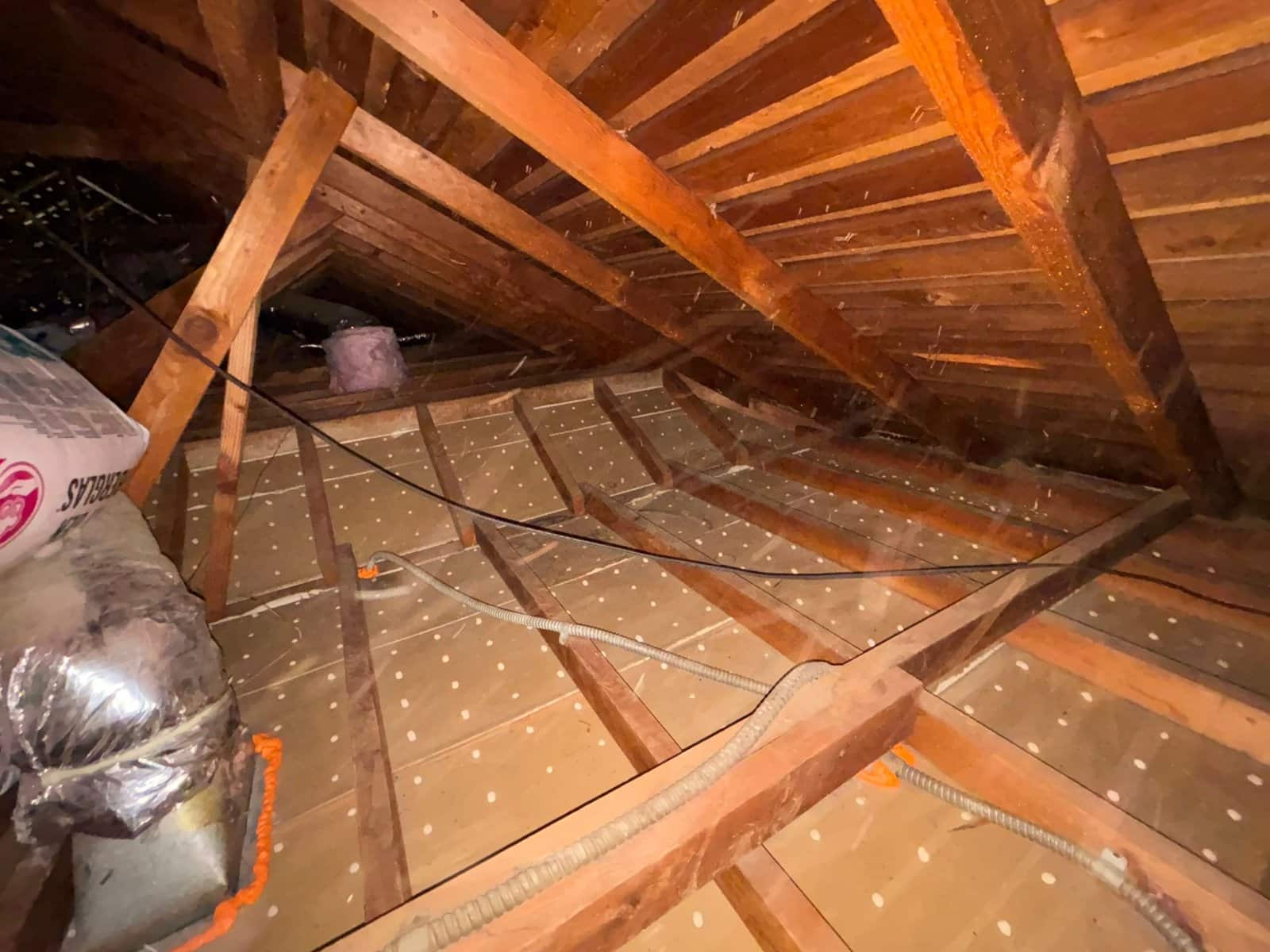 Los Angeles attic after removal, joists and deck cleaned