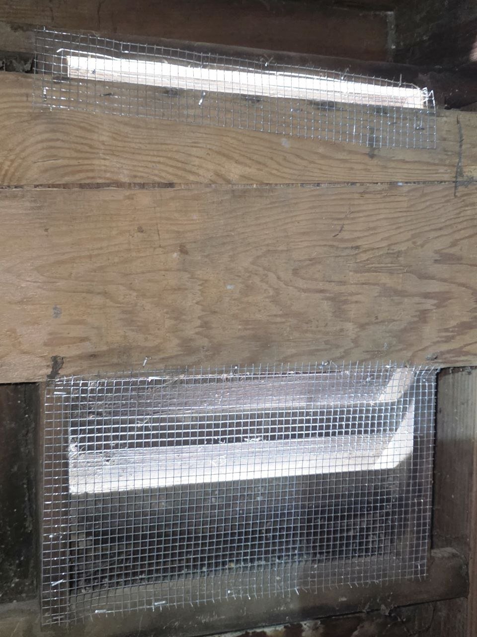 Screened attic vent opening in Oakland