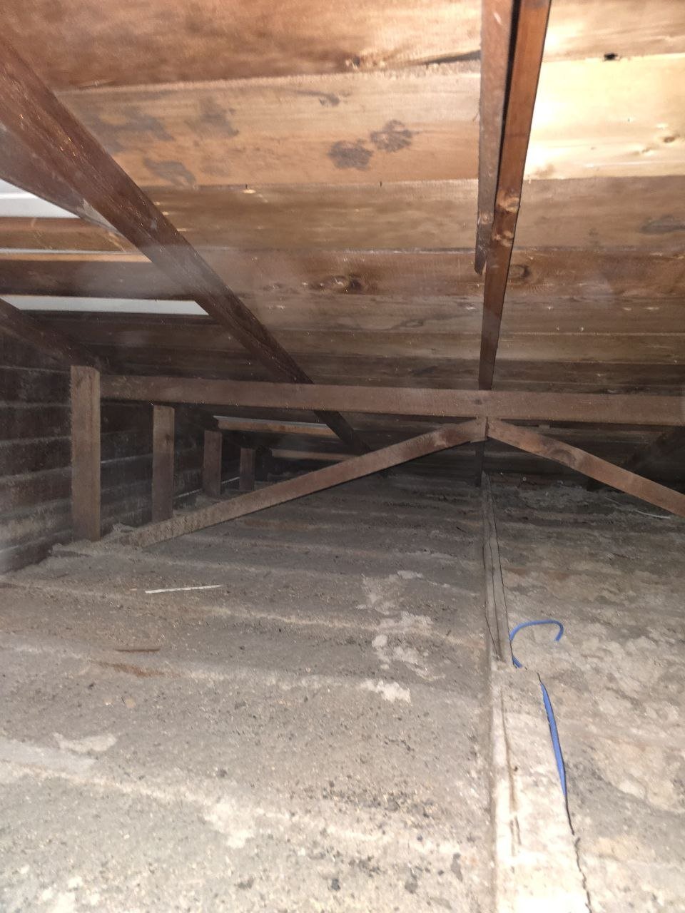 Oakland attic before work, old insulation