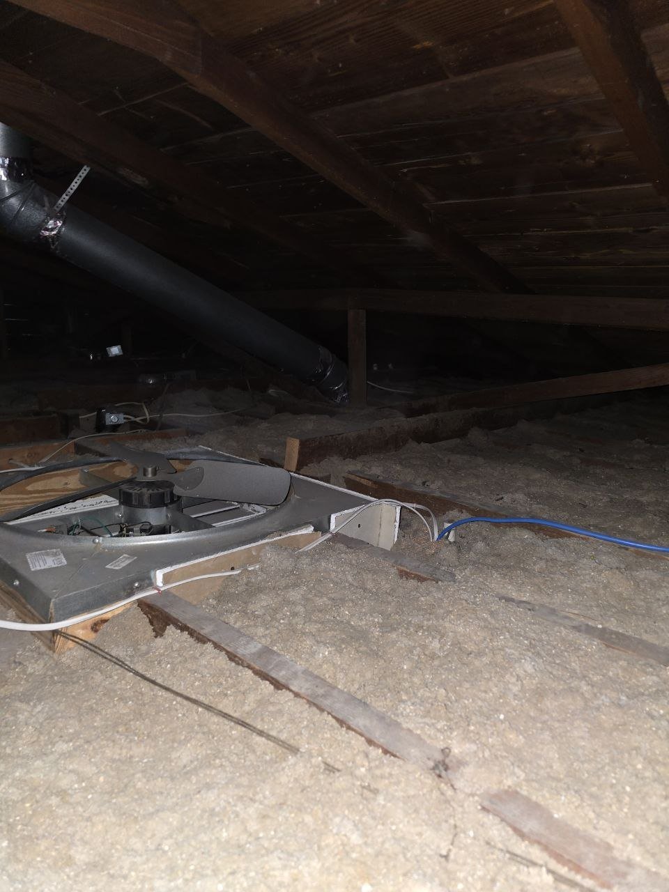 Another area of old insulation in the Oakland attic before work