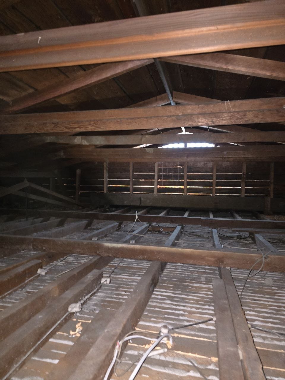 Cleared attic floor from end to end in Oakland