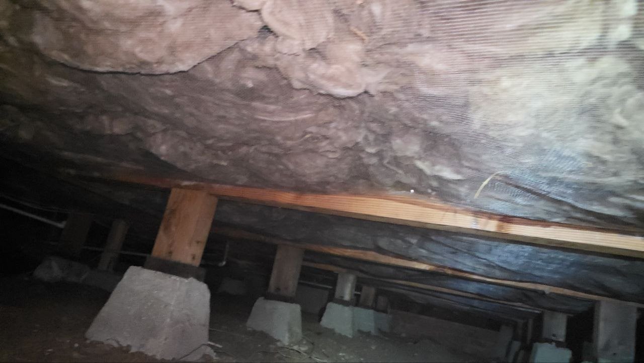 New insulation under the floor of a Palo Alto crawl space