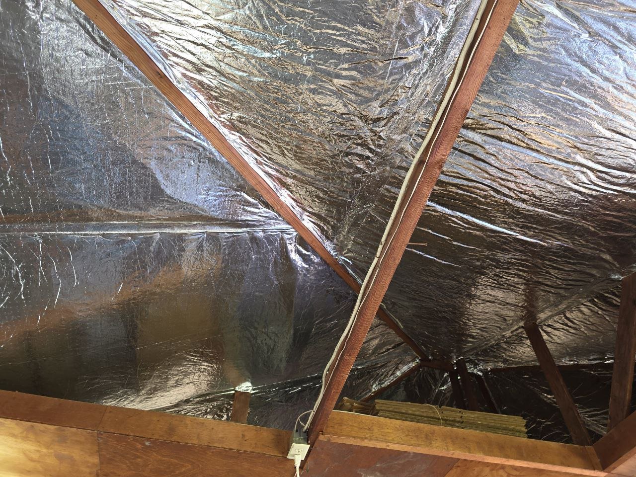 Radiant barrier on the underside of the roof deck in a Palo Alto attic