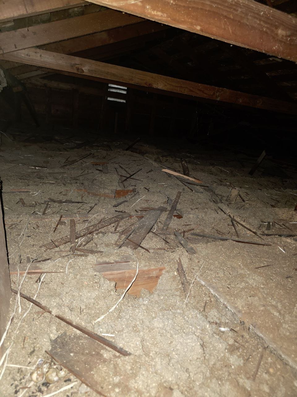 Palo Alto attic before work, old insulation and debris