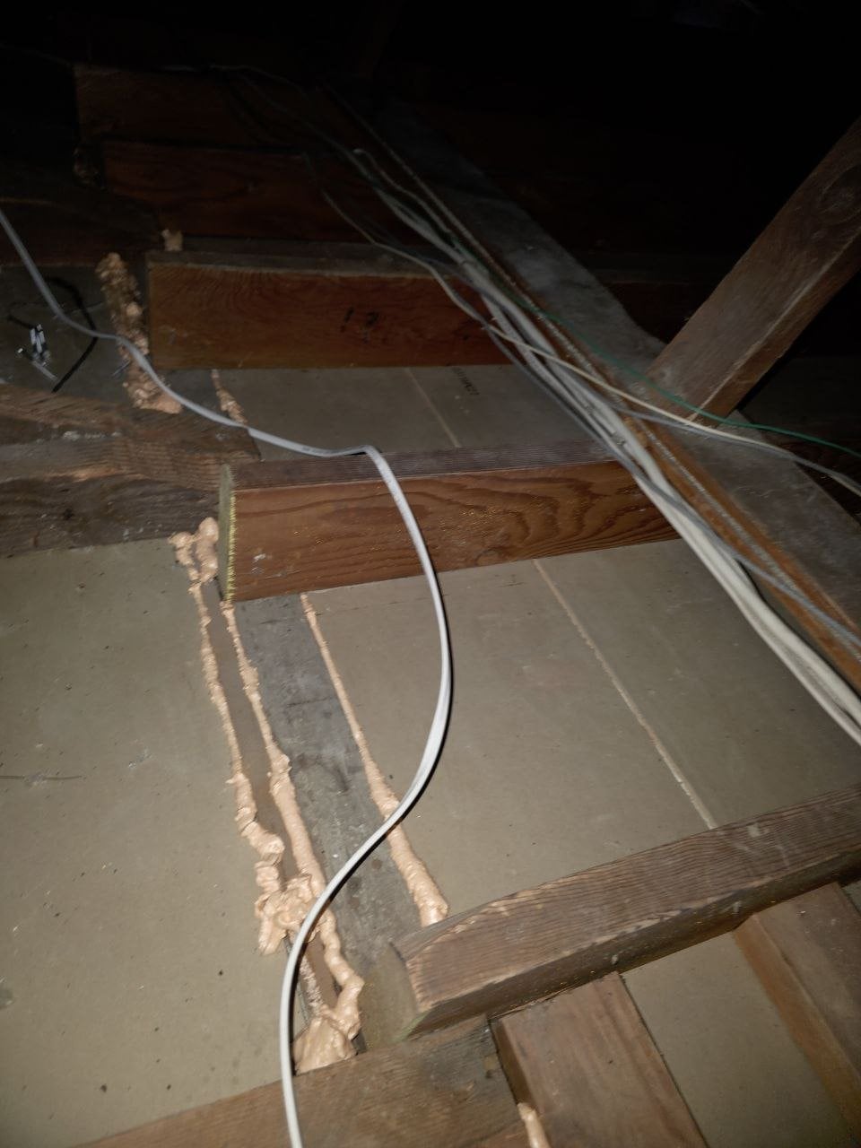 Polyurethane foam air sealing along attic framing in Petaluma