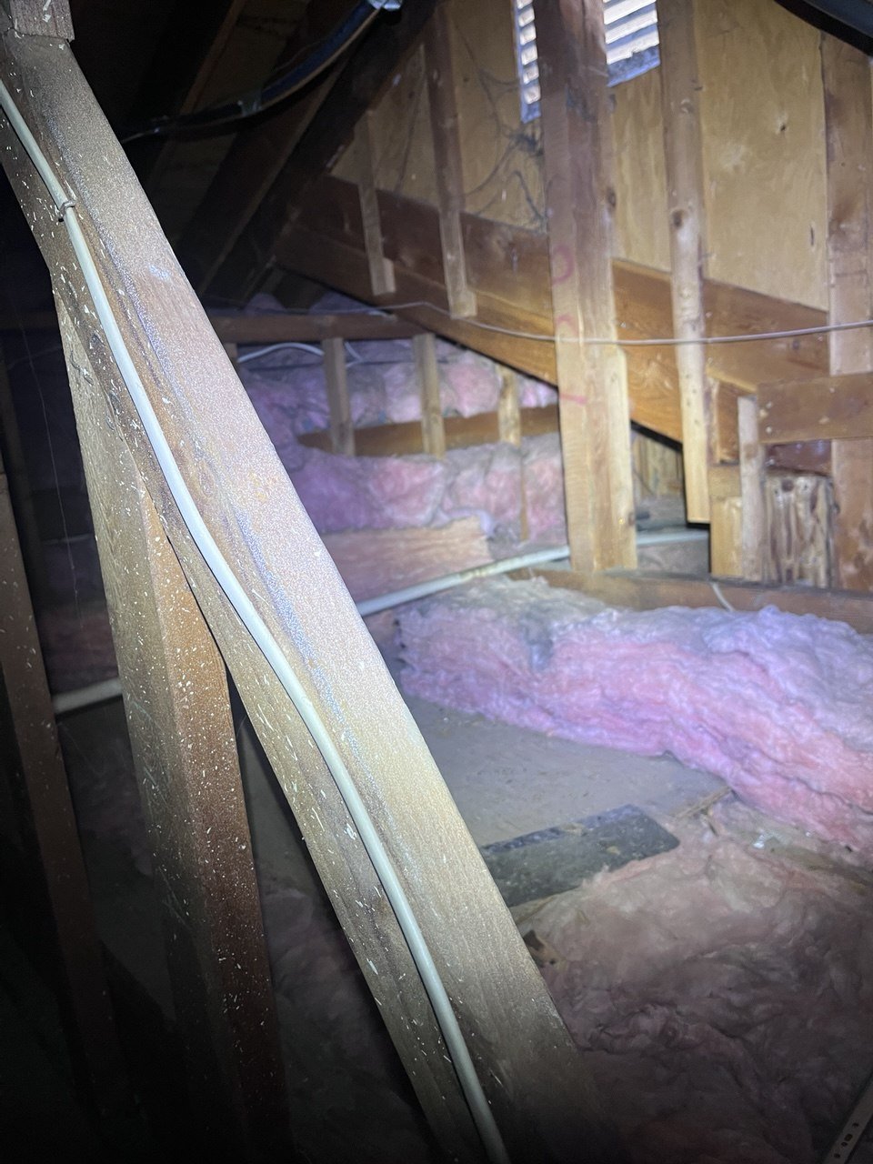 Pleasanton attic before work, old insulation