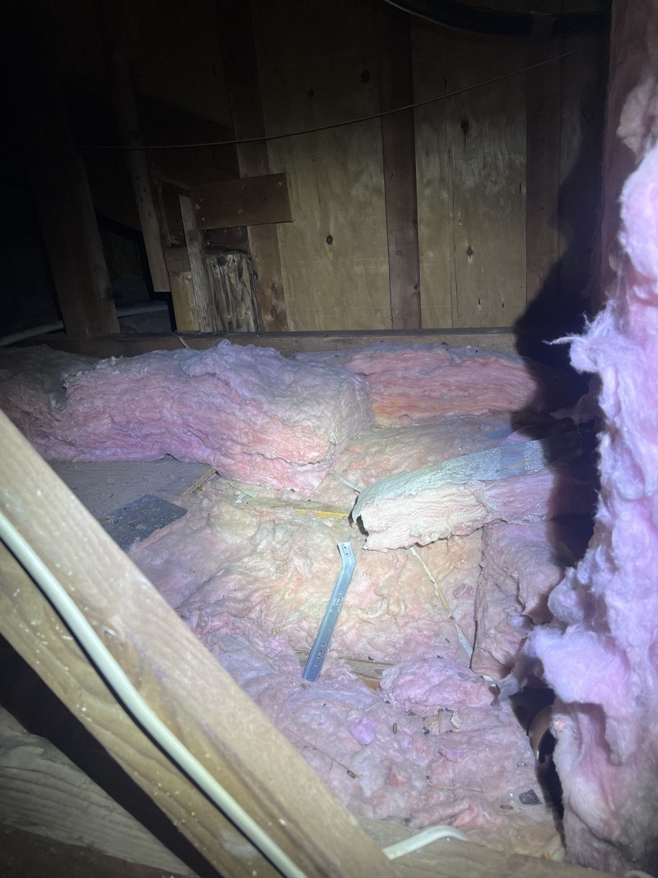 Another area of old insulation in the Pleasanton attic before work
