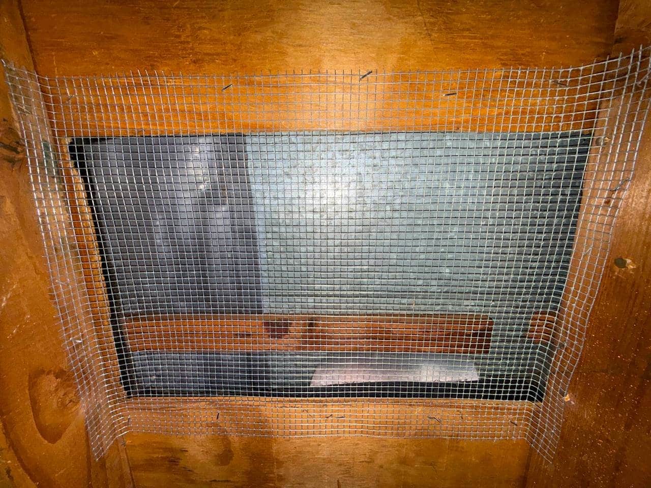 Attic vent screened with wire mesh in Pleasanton
