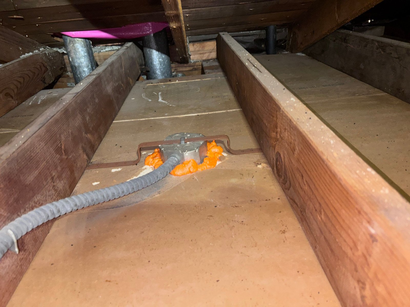 Foam air sealing around an attic penetration in Redondo Beach