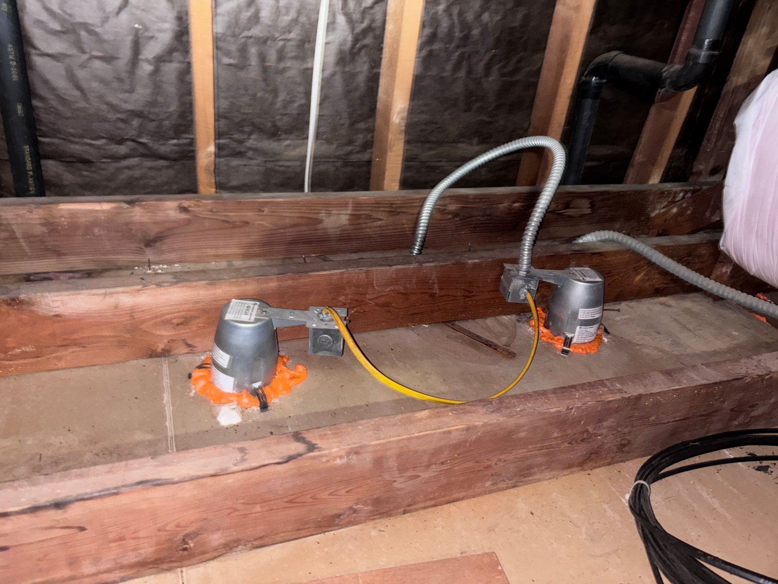 Foam air sealing around a fixture housing in a Redondo Beach attic