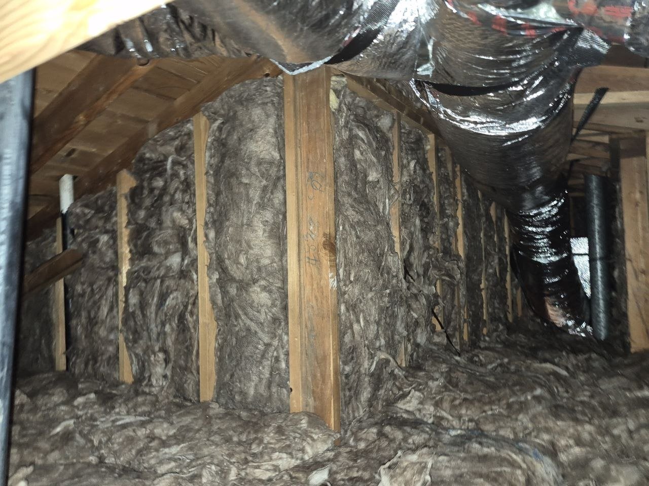 New insulation in the attic walls and floor of a San Jose home