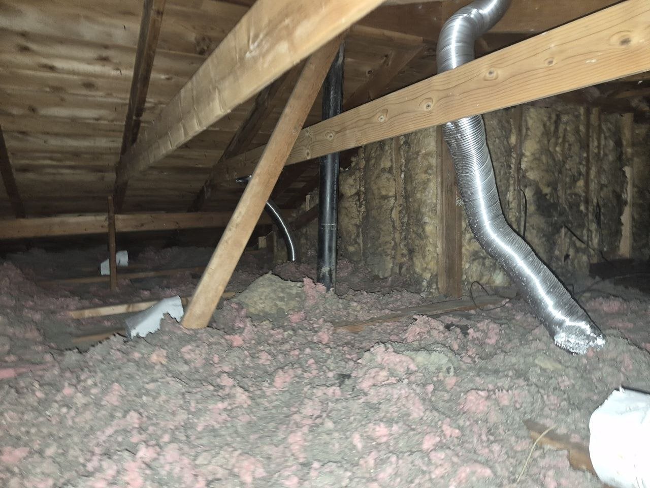 Another area of old insulation in the San Jose attic before work