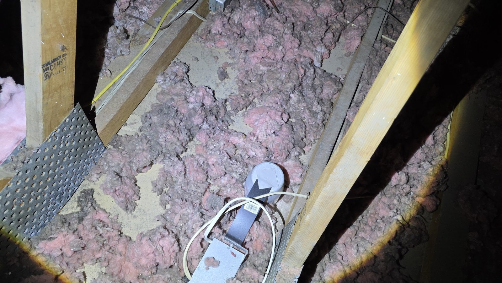 Another area of old insulation in the San Jose attic before work