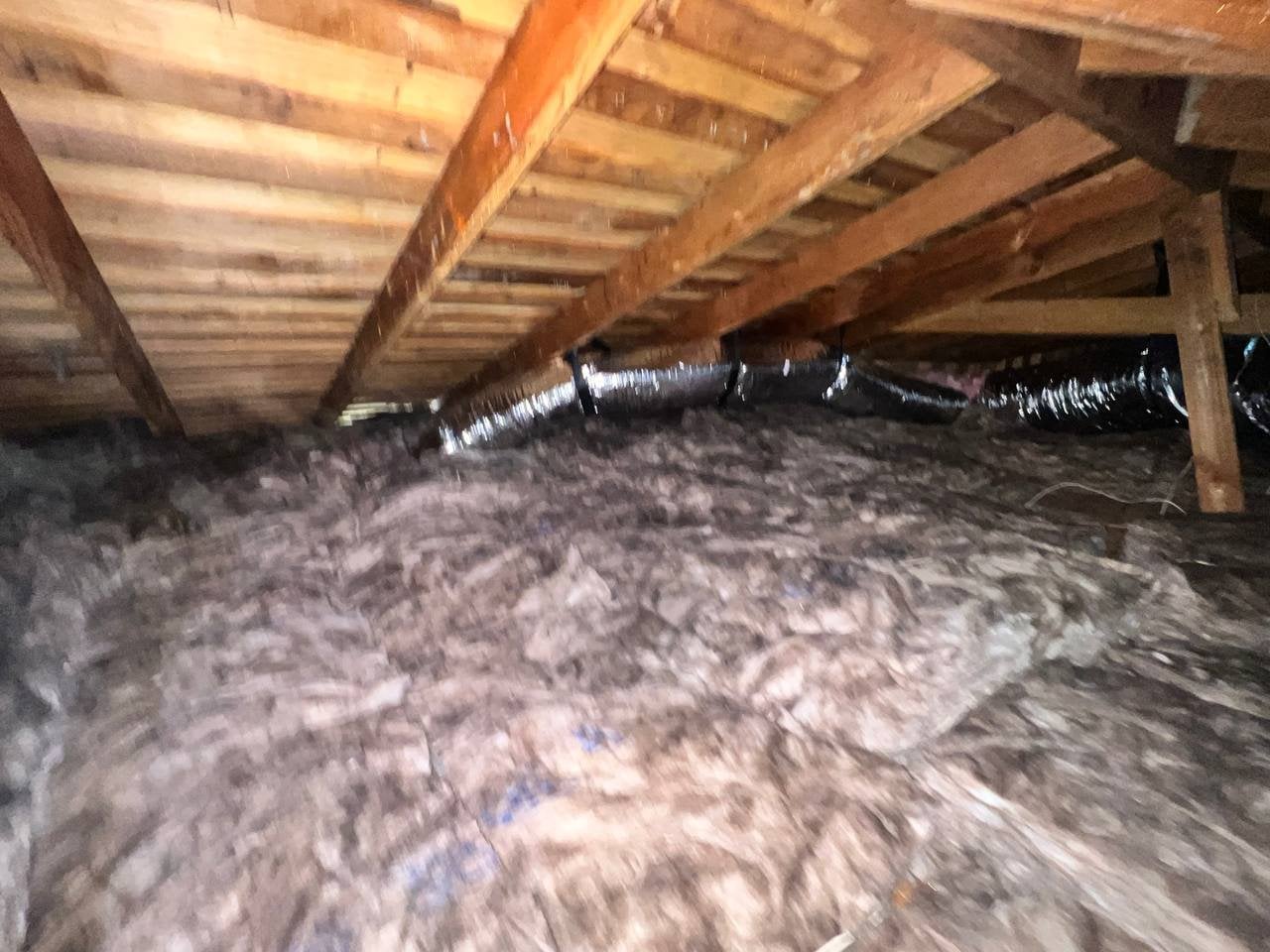 New flexible air ducts and new insulation in a San Jose attic