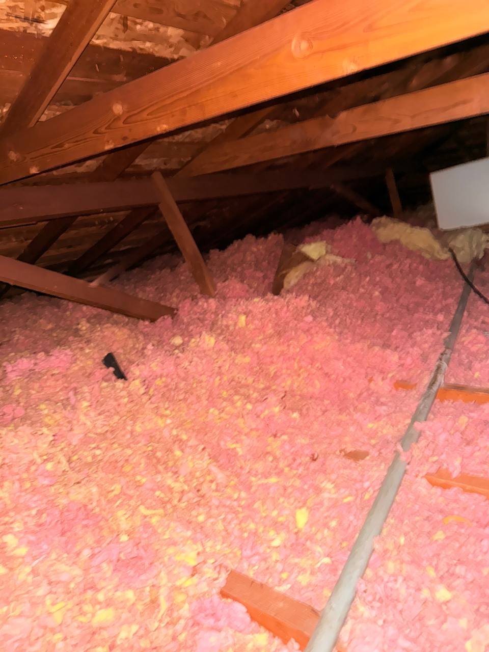 Another area of old insulation in the San Jose attic before work