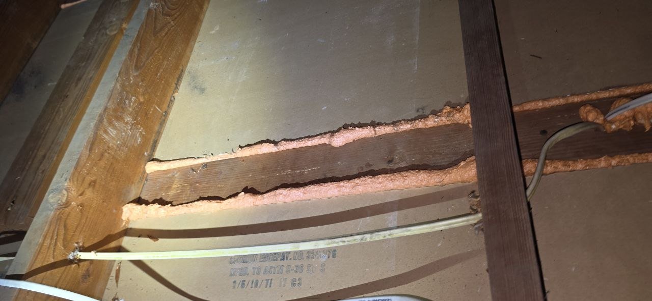 Polyurethane foam air sealing along attic framing in San Jose