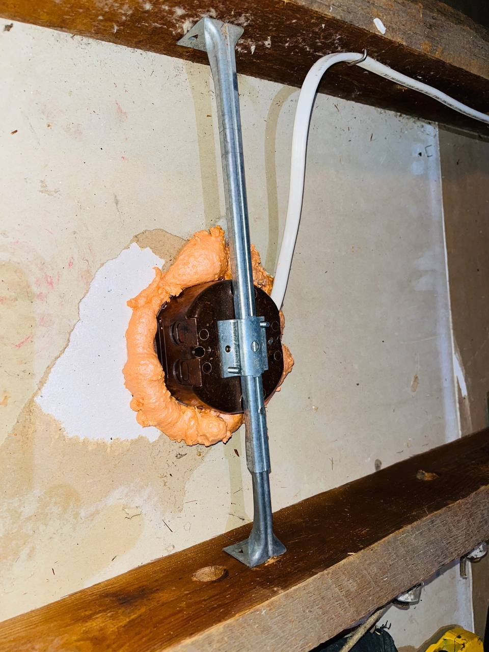 Foam air sealing around an attic penetration in San Jose