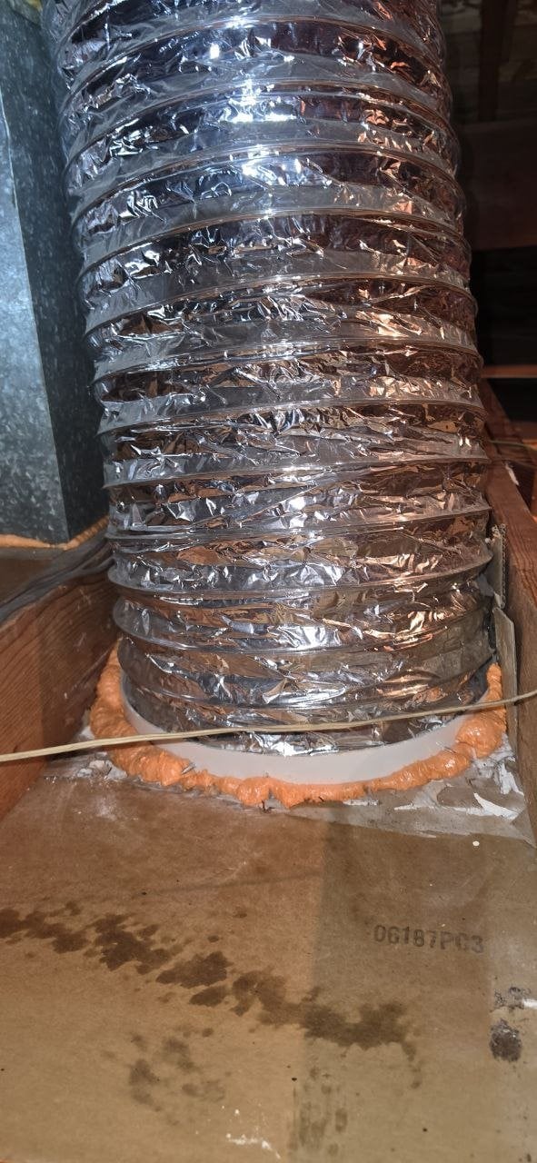 New flexible air duct with foam sealing at the base in a Santa Clara attic