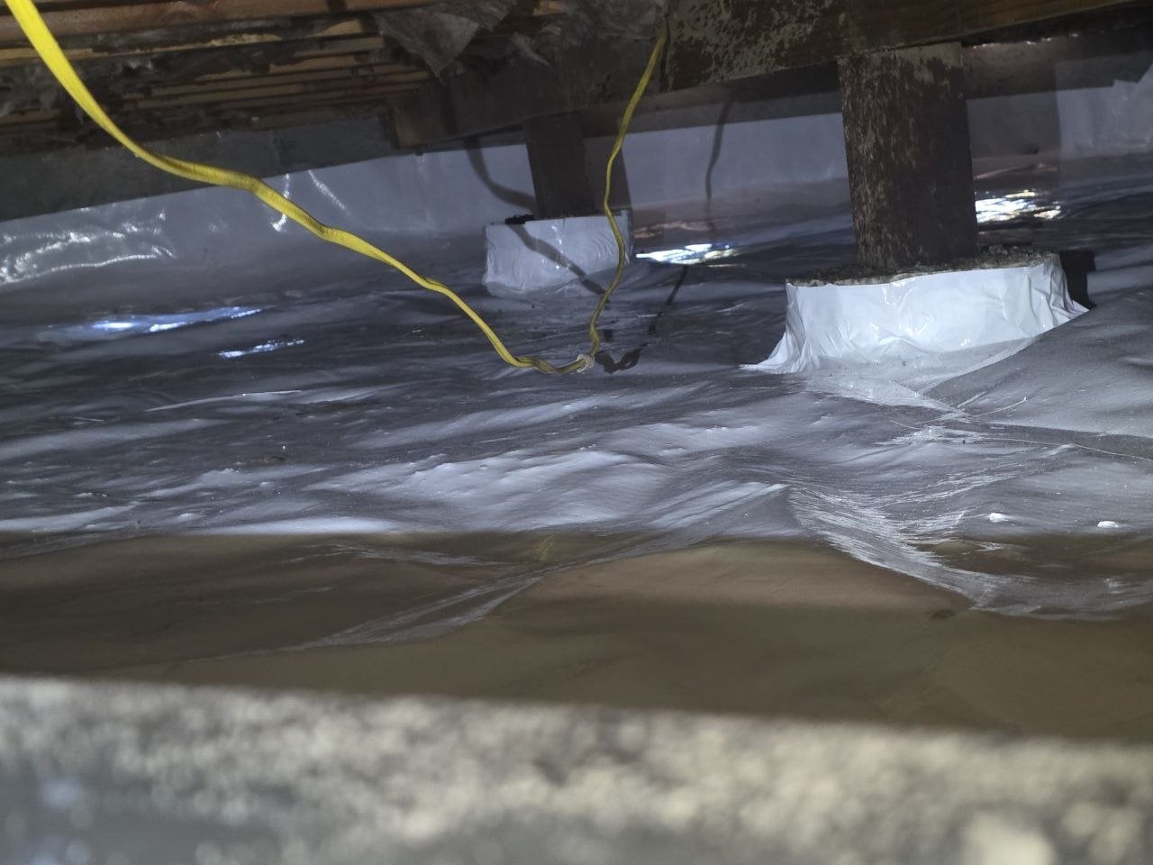 Santa Rosa crawl space after the job, new vapor barrier over the soil