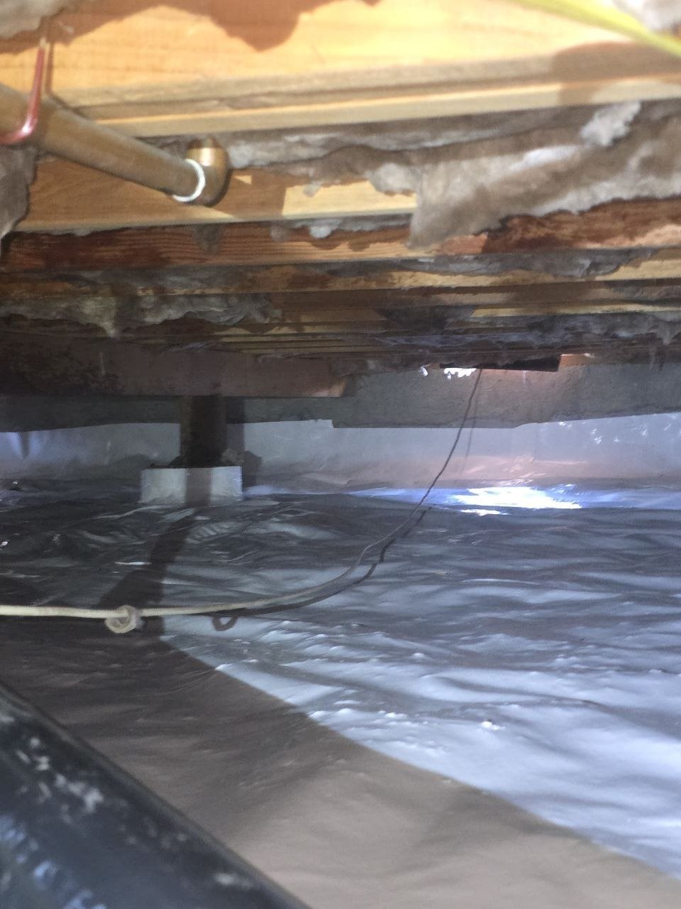 Vapor barrier wrapped around a crawl space pier in Santa Rosa