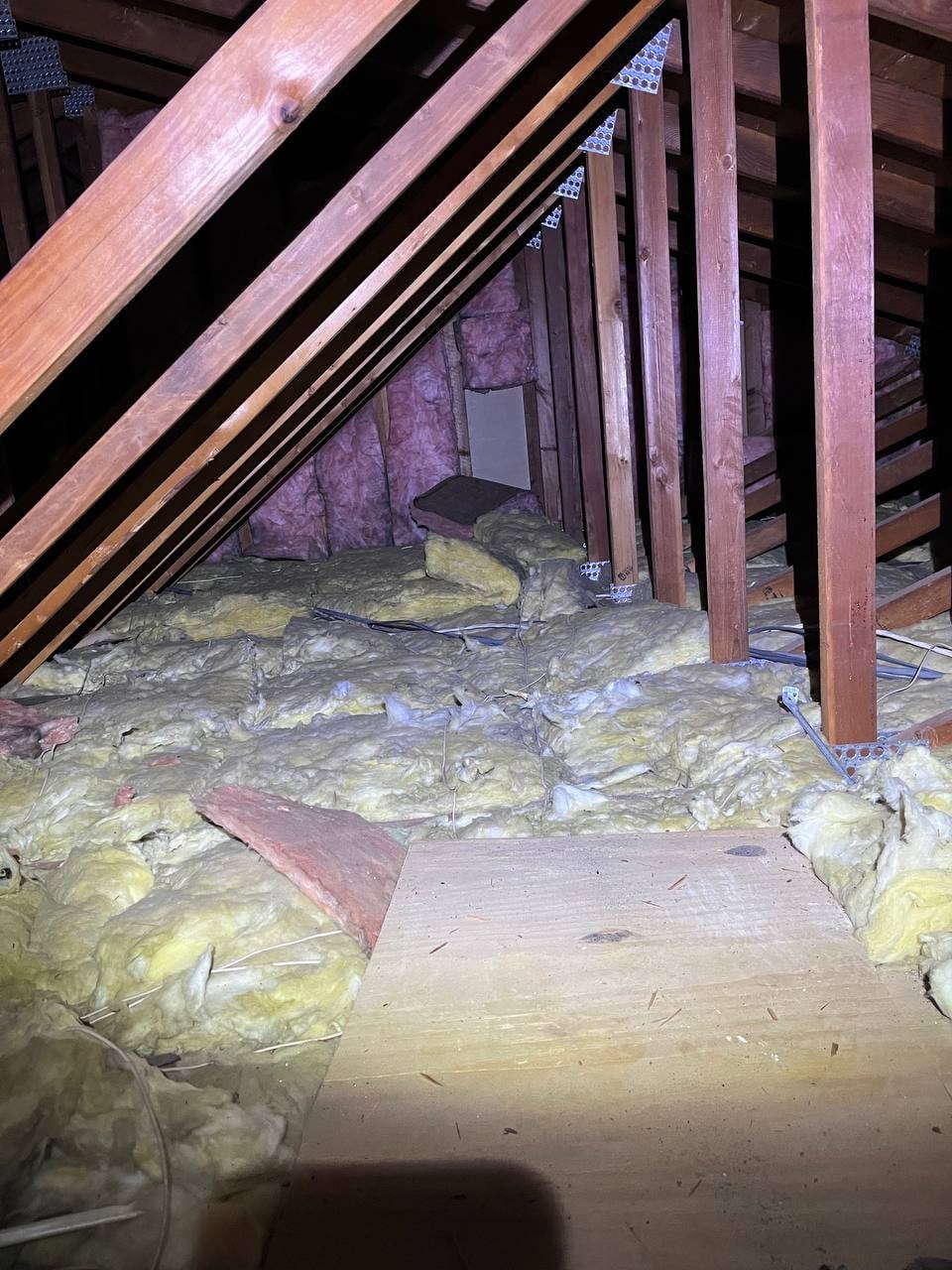 Santa Rosa attic before work, old insulation