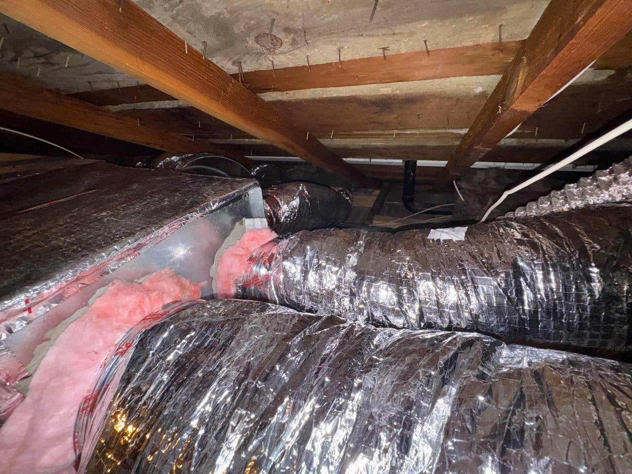 New flexible air duct runs in a Santa Rosa attic