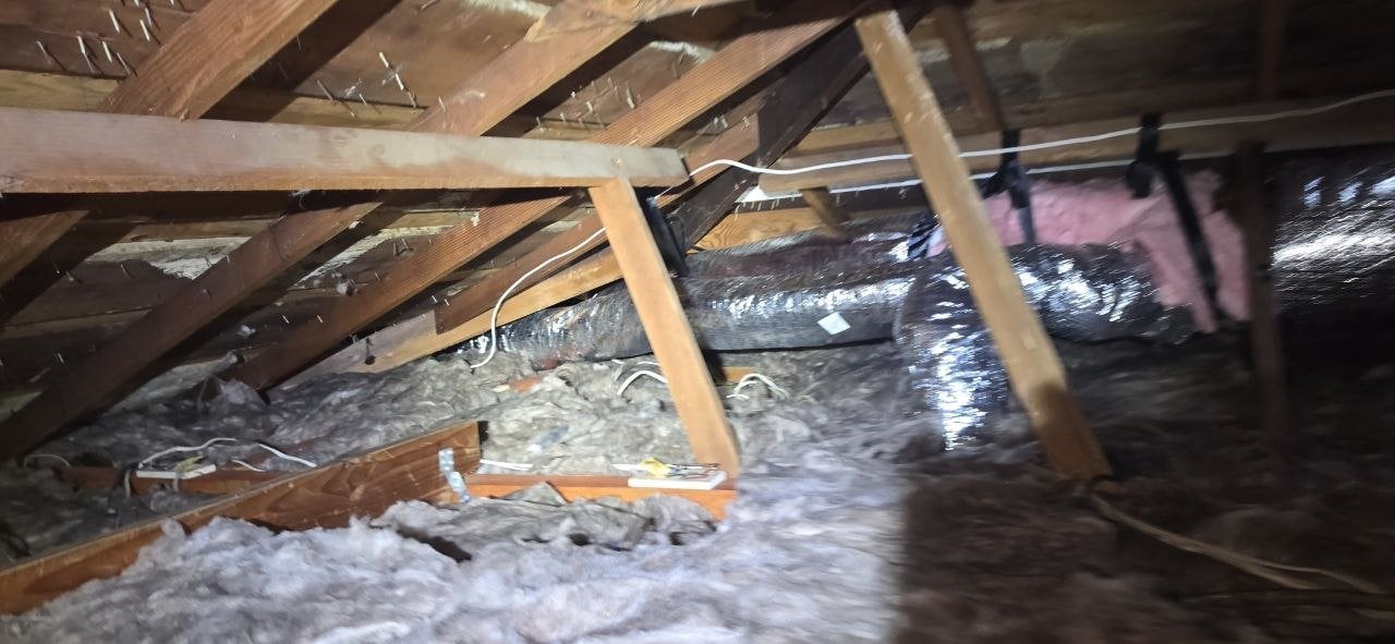 Santa Rosa attic before work, old insulation