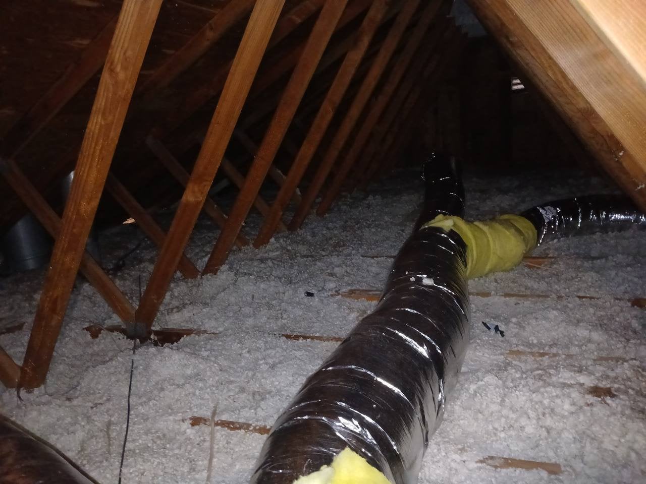 Santa Rosa attic before work, old insulation