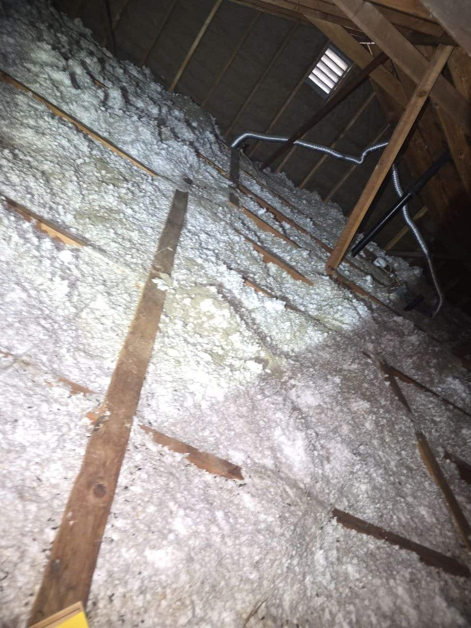 Another area of old insulation in the Sunnyvale attic before work