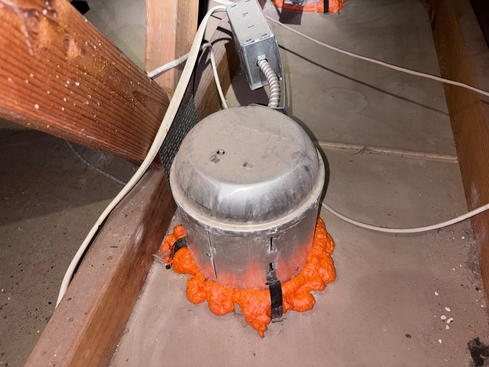 Foam air sealing around an attic penetration in Thousand Oaks