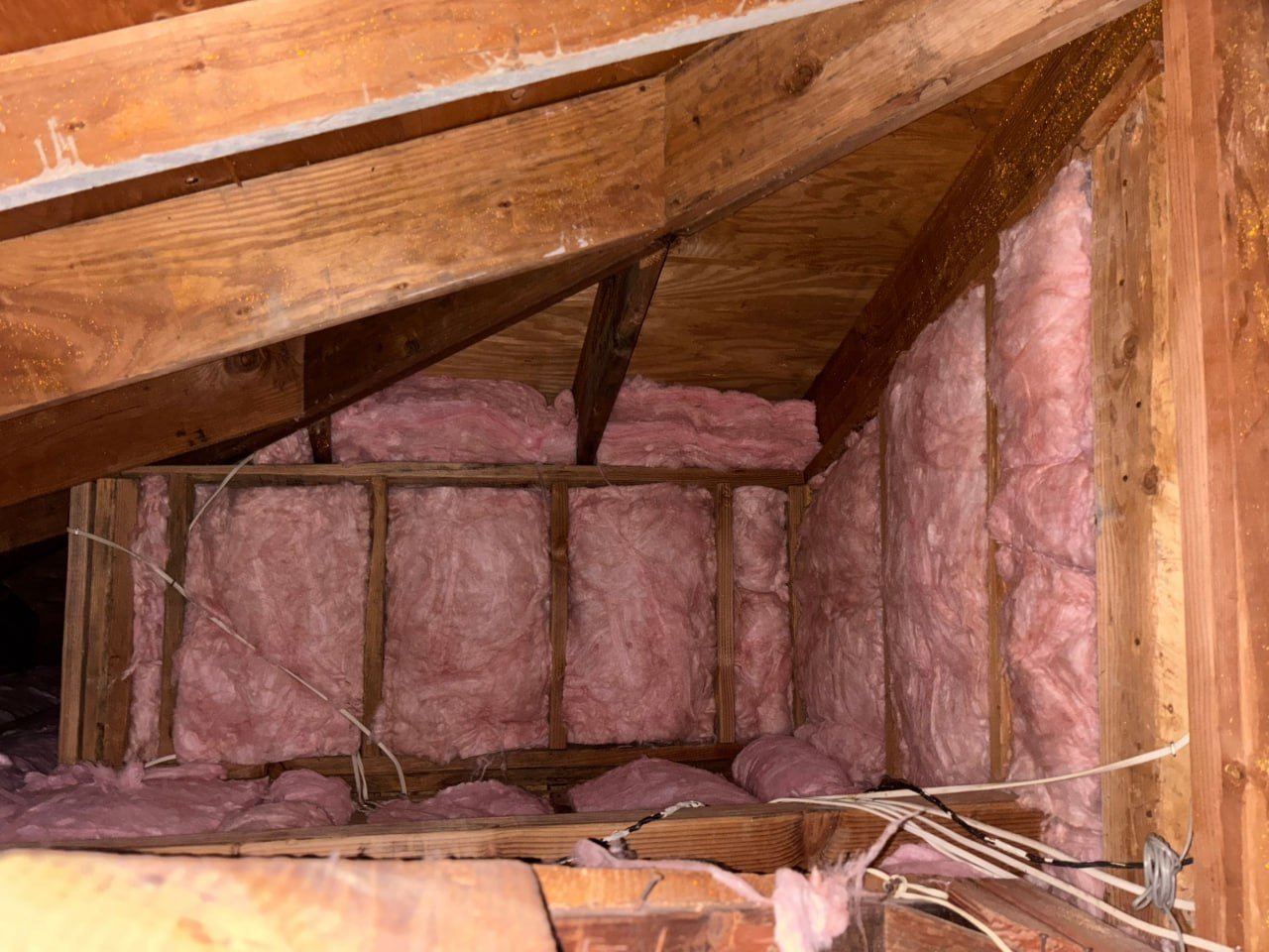 New insulation batts in attic wall framing in Torrance