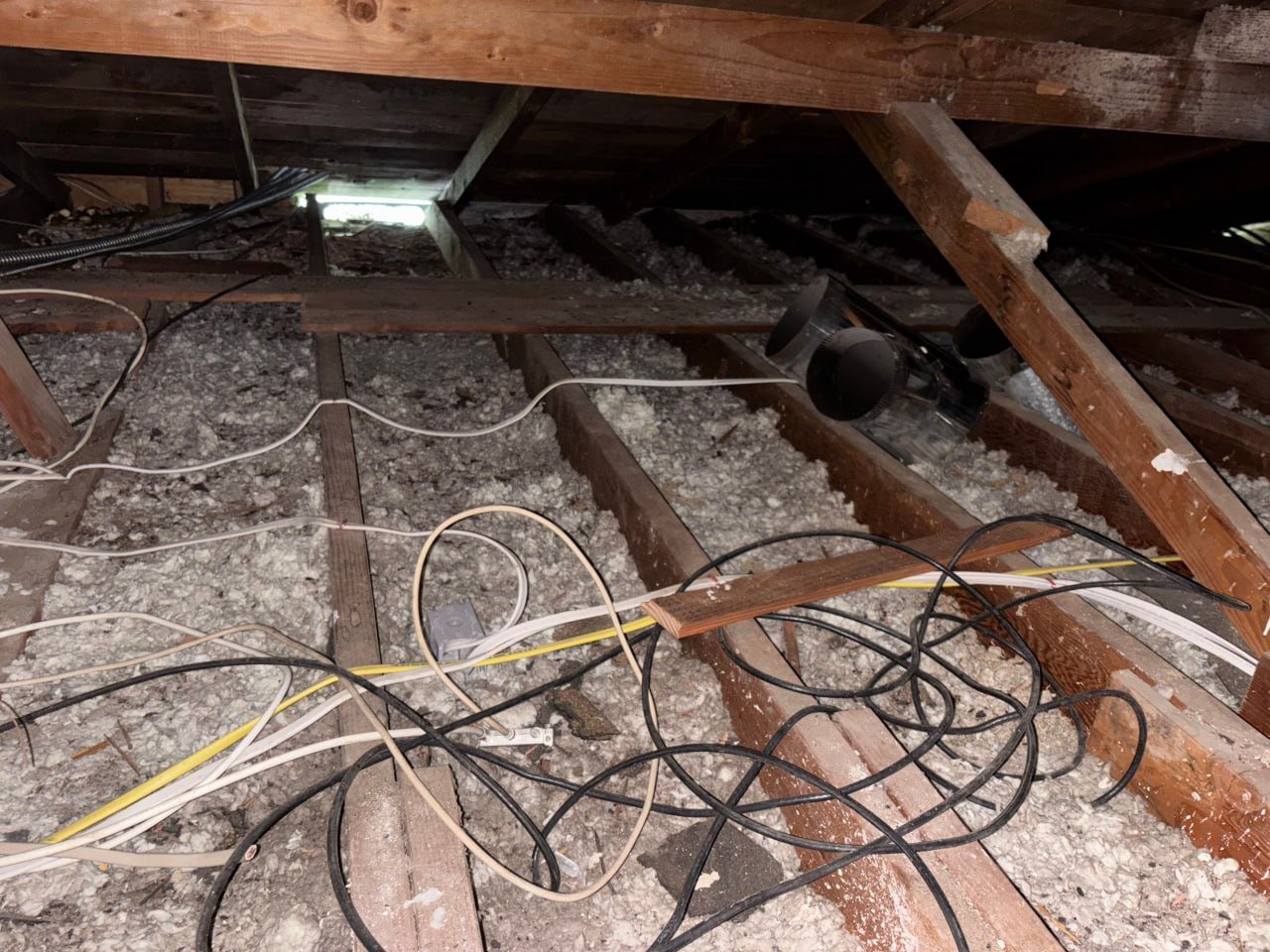Torrance attic before work, old insulation