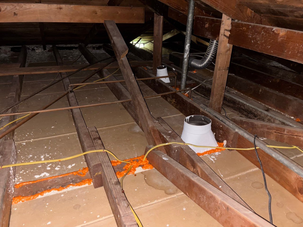 Polyurethane foam air sealing along attic framing in Torrance