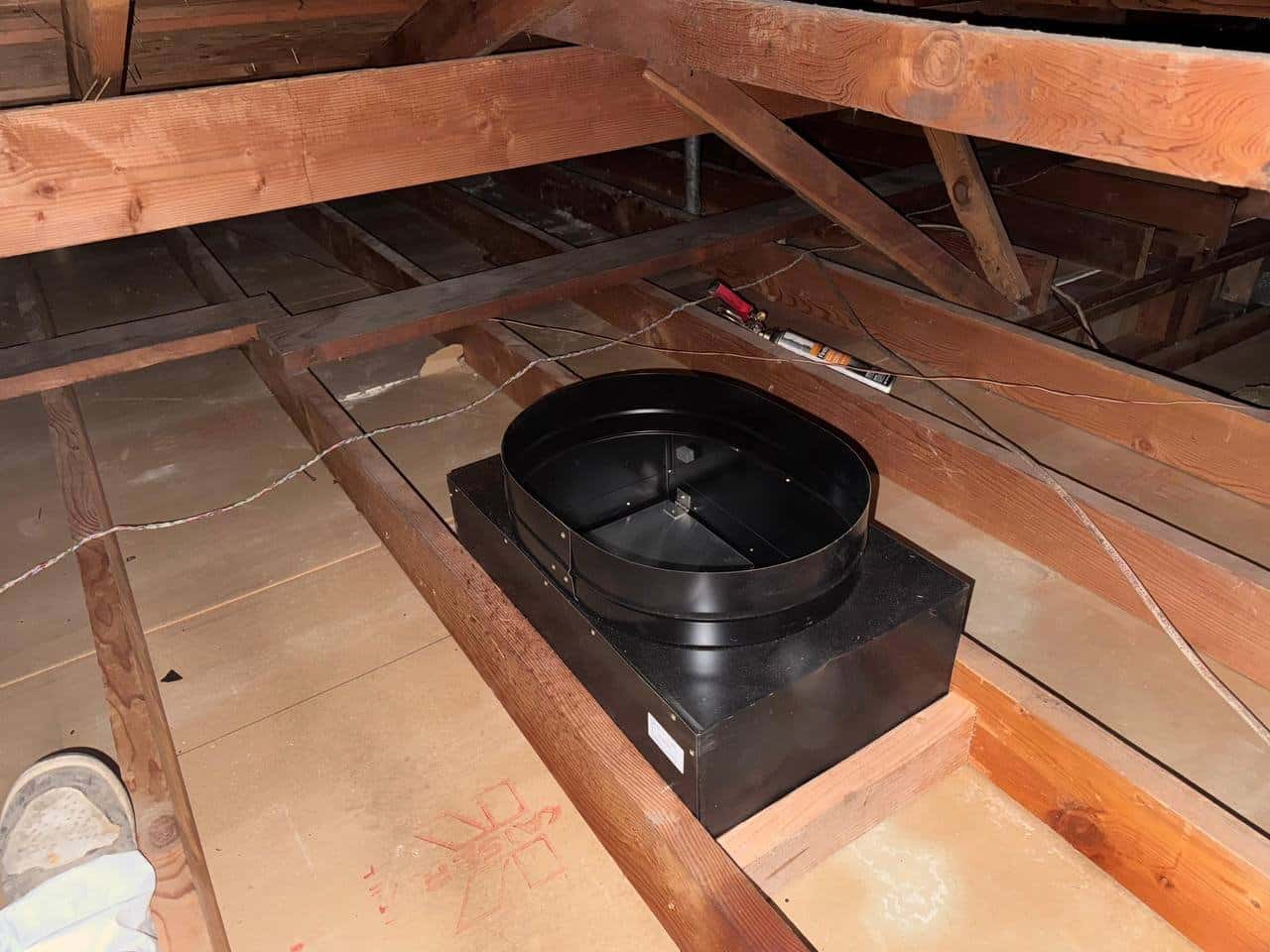 Attic fan housing installed in a Tracy attic