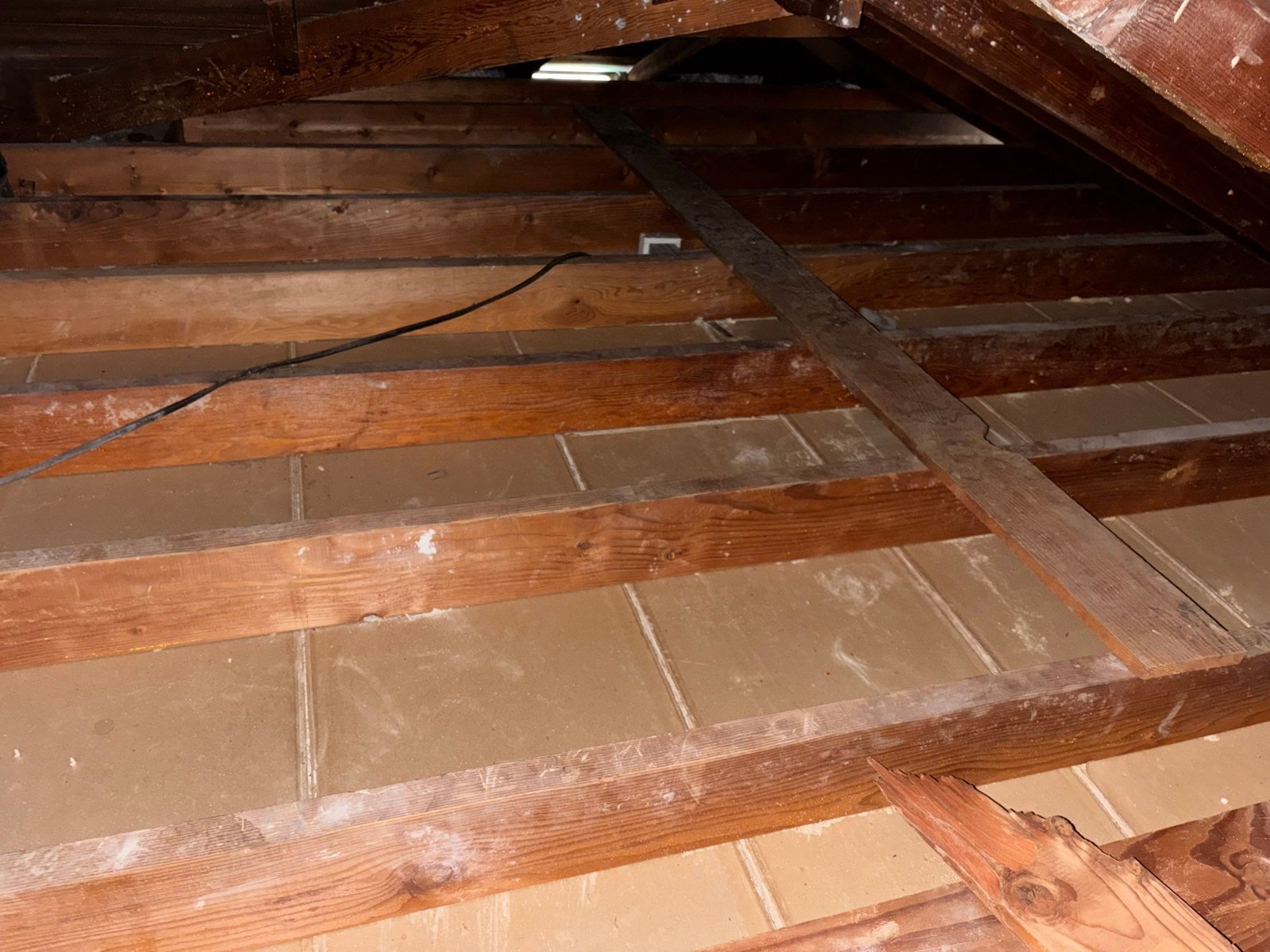 Upland attic after removal, joists and deck cleaned