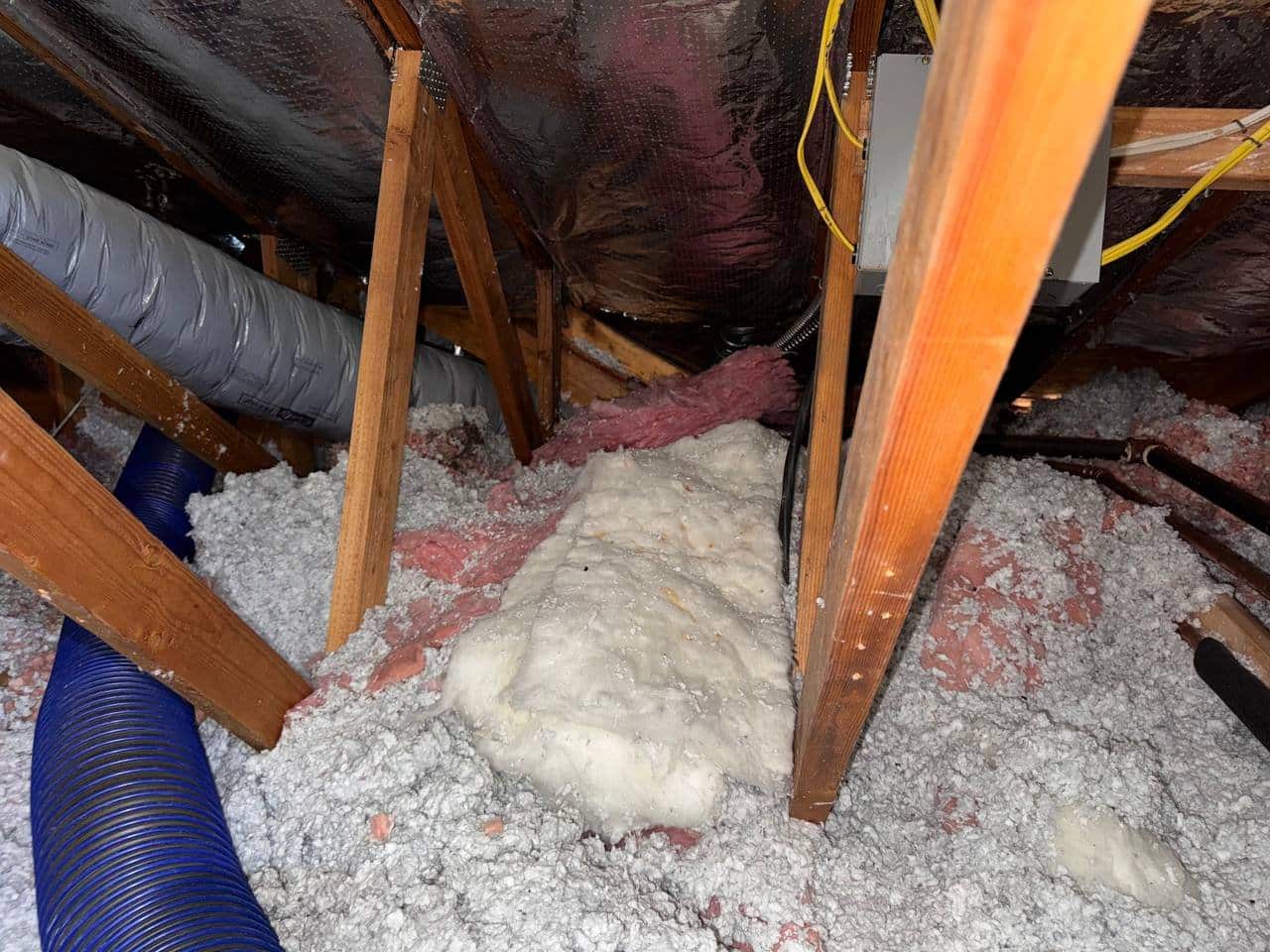 Another area of old insulation in the Vacaville attic before work
