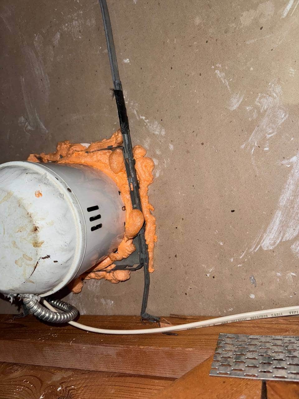 Foam air sealing around an attic penetration in Vacaville