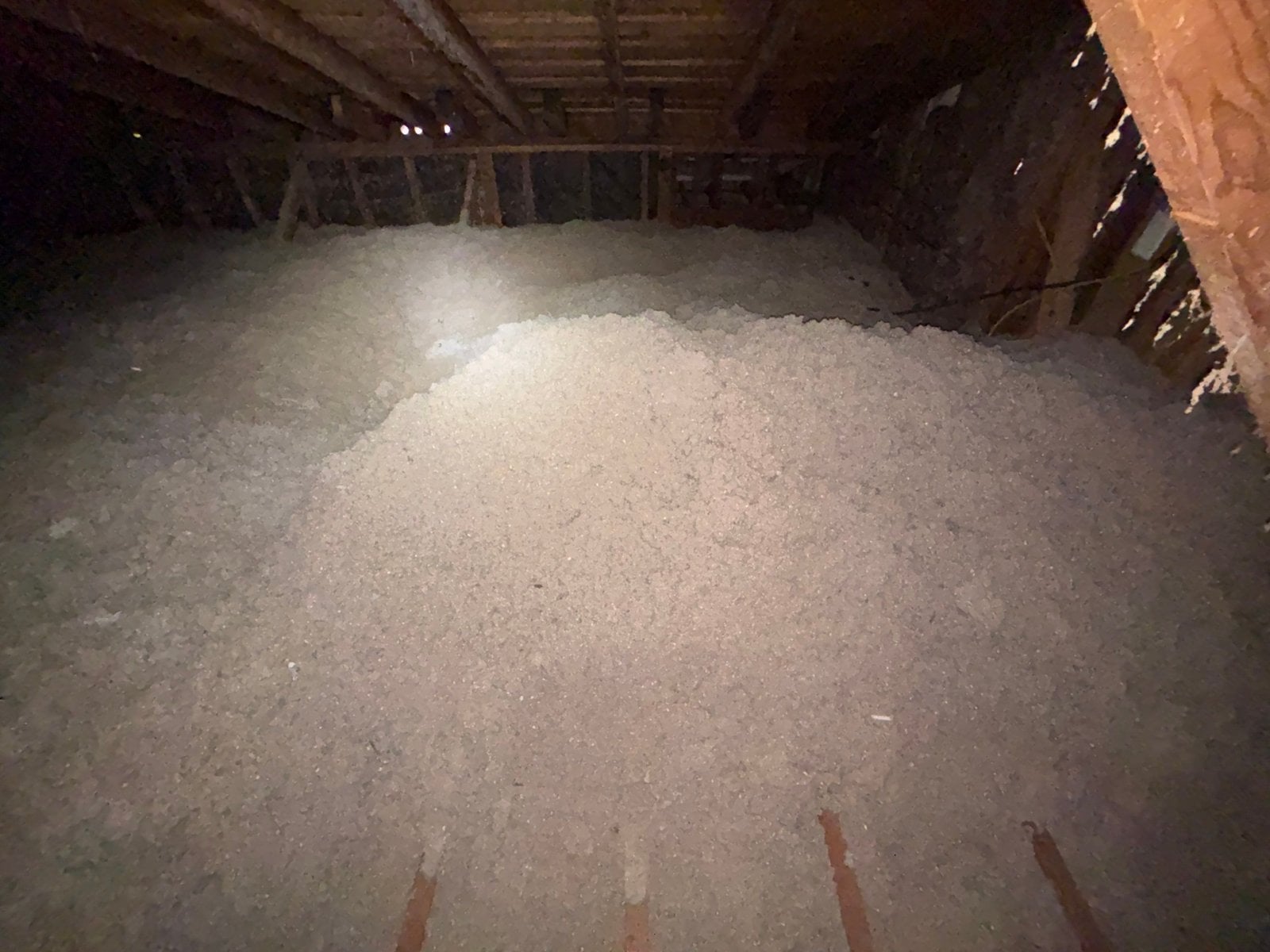 Another area of old insulation in the Westlake Village attic before work