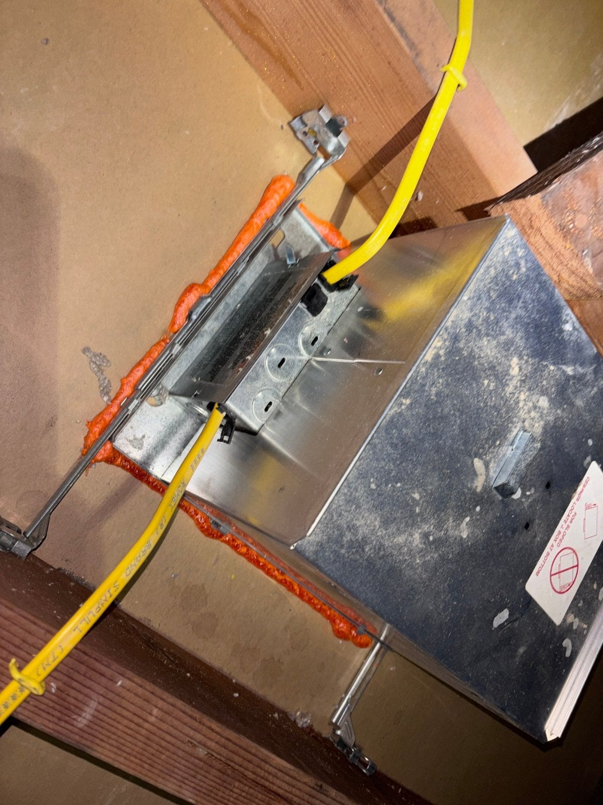 Foam air sealing around a fixture housing in a Westlake Village attic